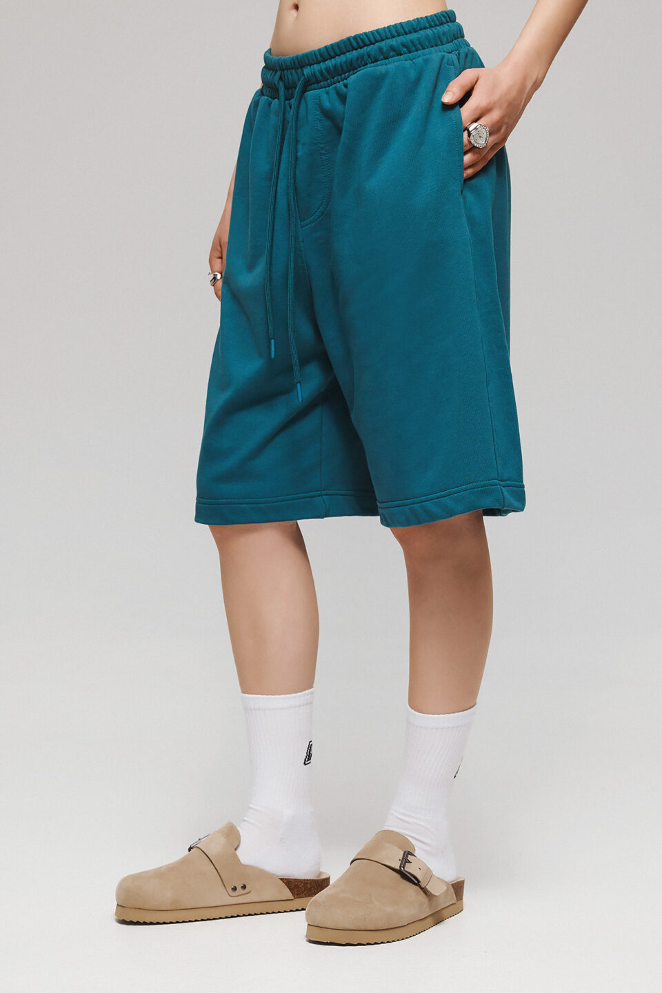 SHORTS IN TRANSFORMATIVE TEAL