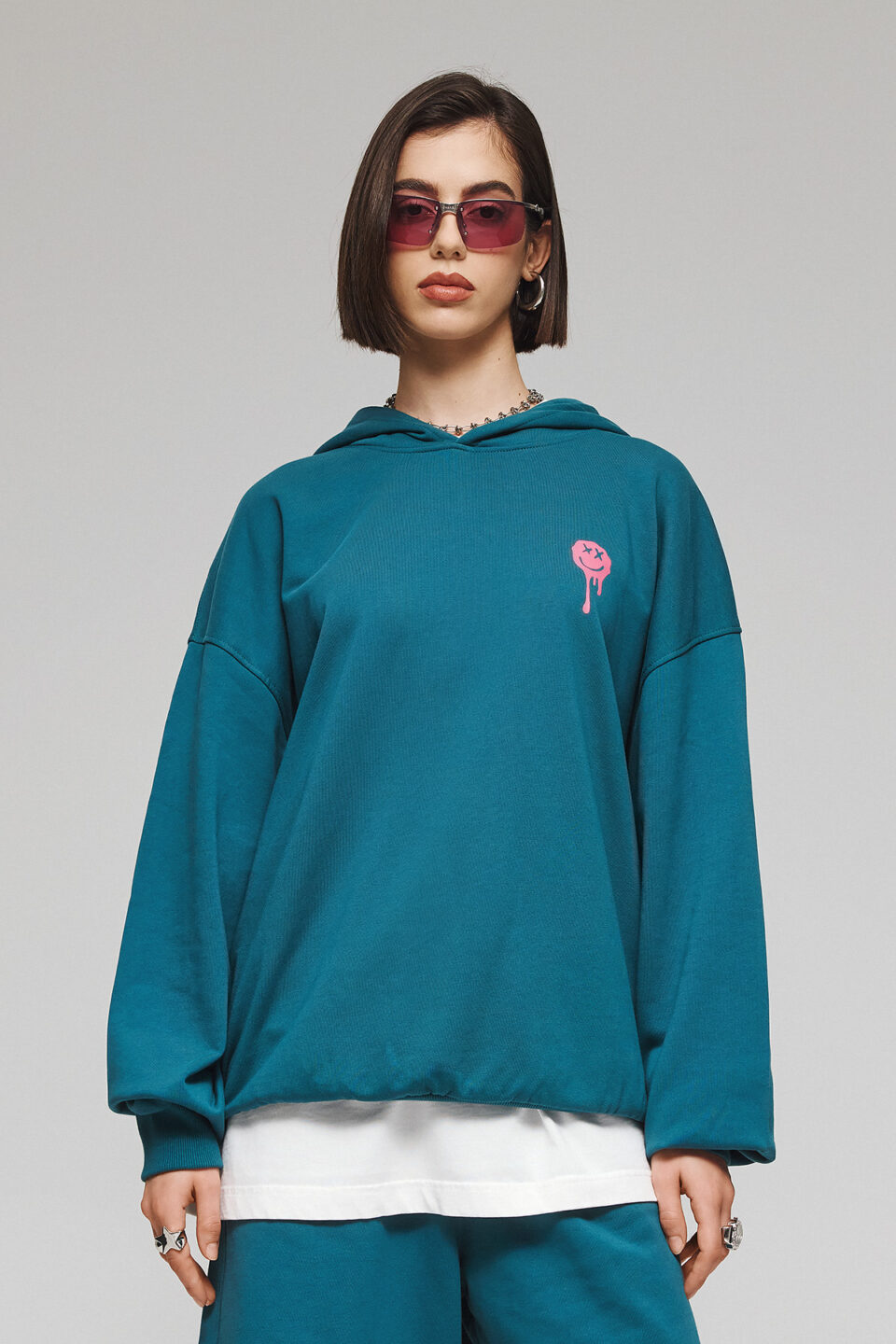 HOODIE BEND THE RULES IN TRANFORMATIVE TEAL
