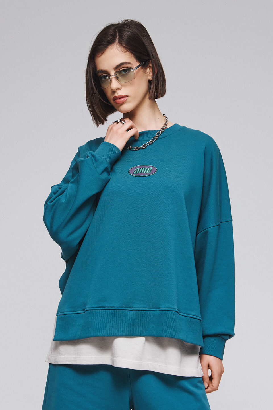 SWEATSHIRT IN TRANSFORMATIVE TEAL