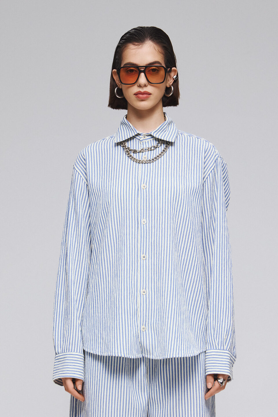 STRIPED SHIRT ON BLUE BASE