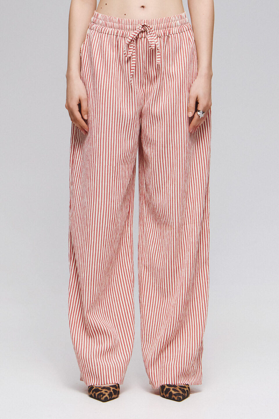 RELAXED FIT STRIPED PANTS ON RED BASE